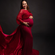 Studio maternity shoot with elegant posing and professional styling