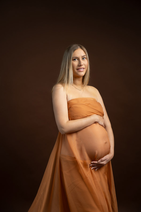 pregnancy shootin sharjah in orange fabric