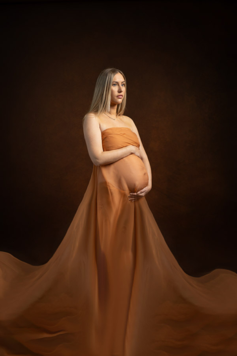 Dramatic orange silk robe maternity photoshoot – Dubai maternity photographer | Arpna Photography