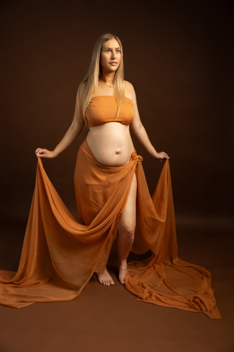 orange fabric maternity photoshoot – Abu Dhabi maternity photographer | Arpna Photography