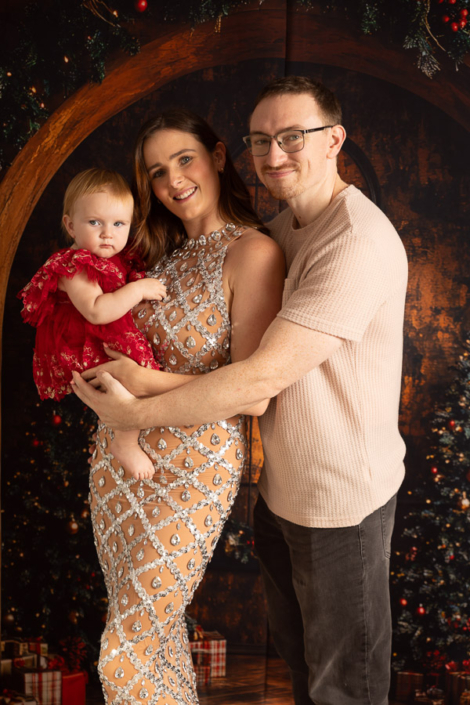 Baby-Christmas-Photoshoot-Dubai-Arpna-Photography Baby Christmas photoshoot in Dubai studio with Christmas tree and festive decor