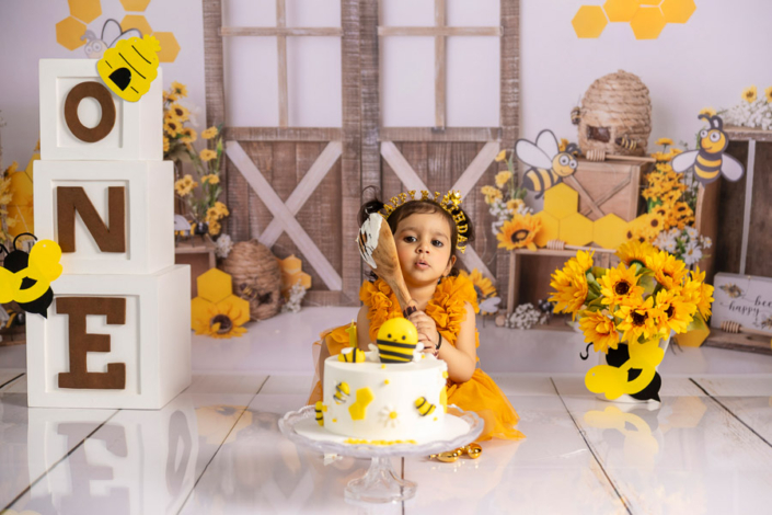 Bee Cake Smash Photography | First Birthday Session Dubai & Sharjah Cake smash photoshoot bee theme for baby first birthday Dubai Sharjah Abu Dhabi