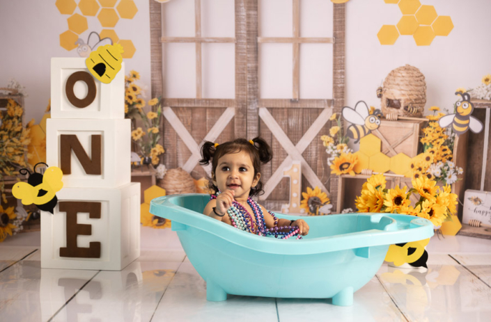 Bee-Themed Cake Smash Photoshoot Dubai | Arpna Photography Bee theme cake smash photoshoot for baby’s first birthday in Dubai by Arpna Photography