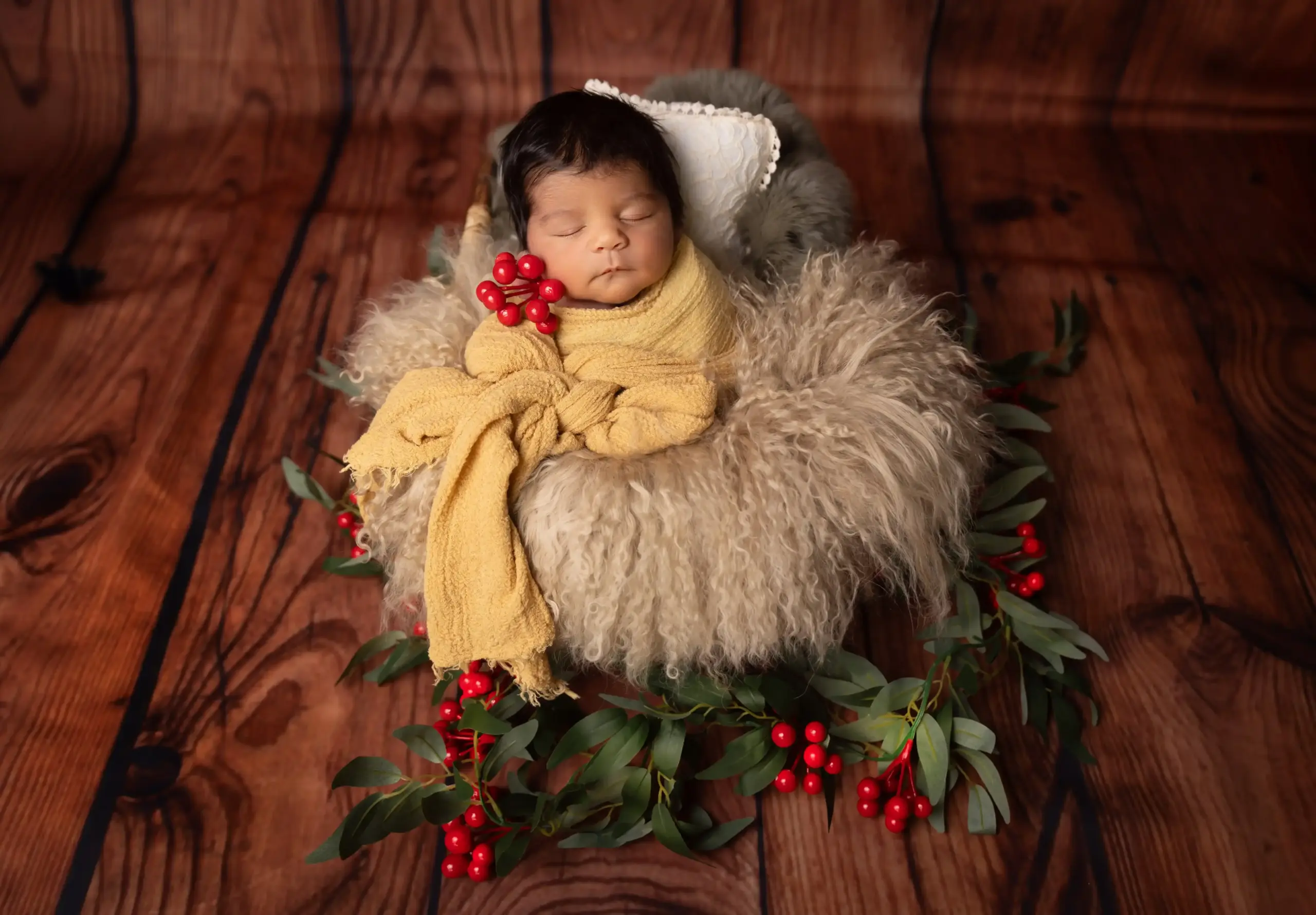 Baby sleeping peacefully during a newborn photography session in Dubai