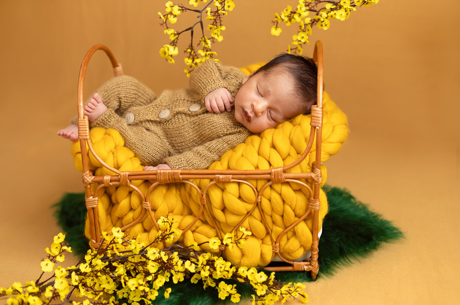 Baby with teddy during newborn photoshoot in Sharjah